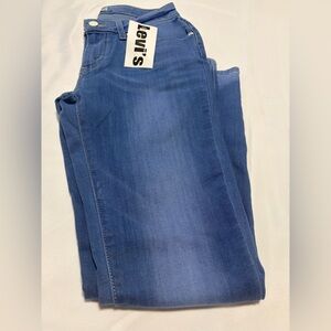 Women’s Levi Stretch Medium Wash Jeans 25x28 NWOT
